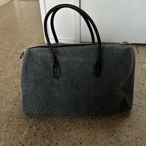 DSW felt duffle bag